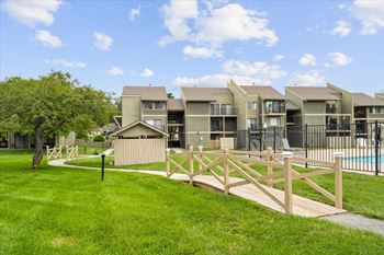 Wooden bridge with external view of property